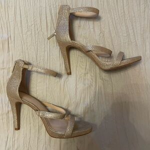 Used Sparkly gold/ light rose gold heels!! Size 6.5.